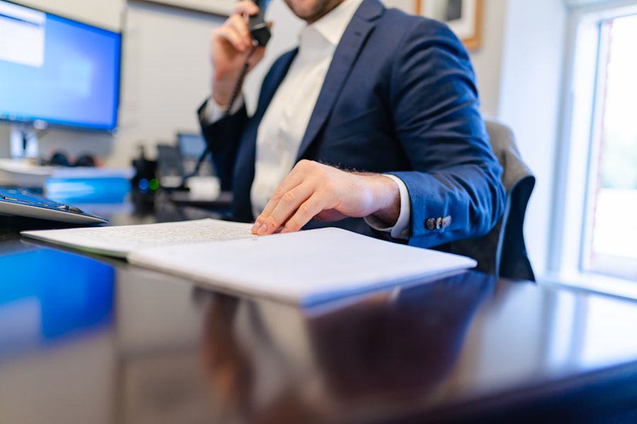 Consultant reviewing documents at a desk