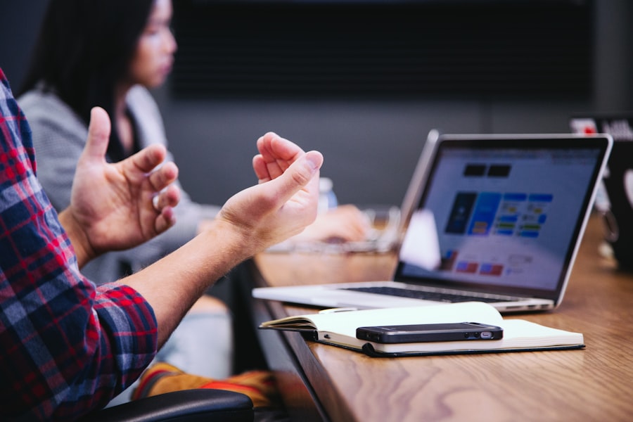 Consultant gesturing during a workplace advisory meeting